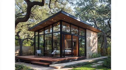 Modern tiny home with large glass windows in a natural landscape offering multifunctional living space and outdoor relaxation