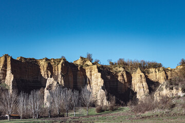 view of the badlands in the land of the crete senesi
