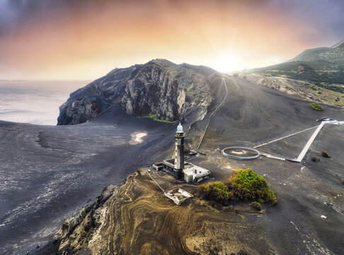 Azores landscape - dramatic sunset over volcano capelinhos in Faial island, Portugal