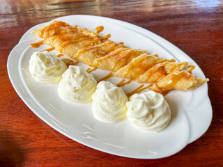 fried roti with egg and sweetened condensed milk