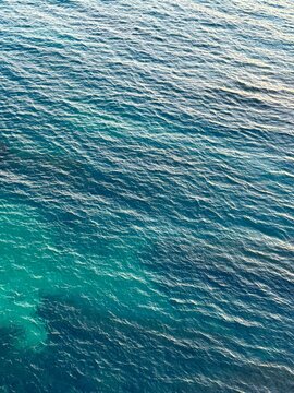 Blue navy rippled water surface background. 