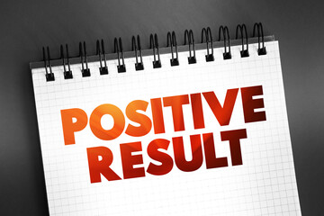 Fototapeta premium Positive Result text on notepad, concept background