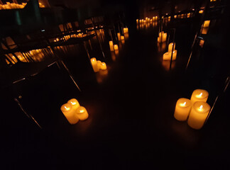 Artificial electric candles close view background, romantic atmosphere