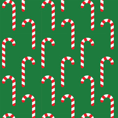 Seamless vector pattern in christmas holiday theme. Red and white candy canes on christmas green background.Infinite patterns, for print and decoration. Background, gift cards, wraping paper, textiles