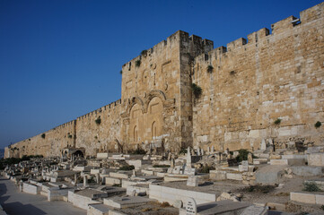 The outer walls of the Old City and Jerusalem and the sealed Mercy Gate and twin arches. © Yehoshua Halevi