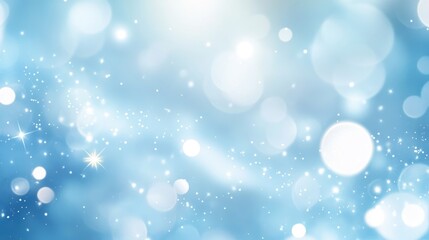 Soft and elegant holiday abstract light blue background with glowing sparkles, creating a serene and festive holiday design