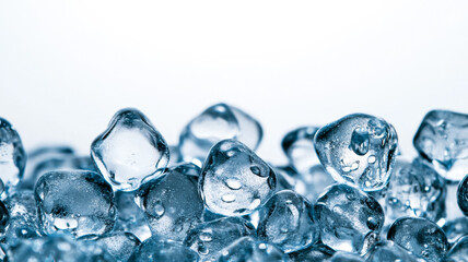 Clear gel with suspended ice blue and silver microbeads set against a cool white background 