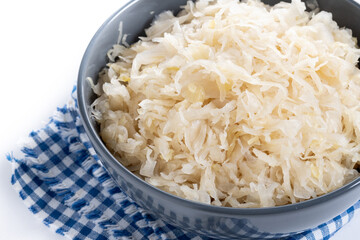 Sauerkraut in a bowl isolated on white background. Close up
