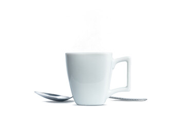 Coffee cup with subtle smoke and silver spoon