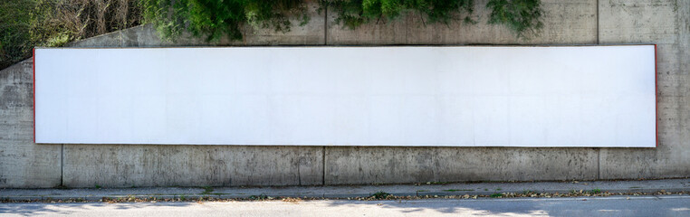 3 x 24 sheet Blank billboard (72 sheets) as a mock up on a  concrete wall  on the street for design presentation