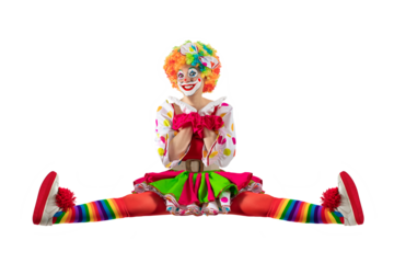 Funny female clown, woman entertainer dressed as a colorful Joker in a suit and wig, with clown whiteface makeup. She is a trickster, jester, pantomime, mime, and a professional actor at events