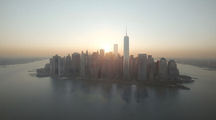 Aerial View of New York City Skyline at Dusk: Iconic Skyscrapers and Statue of Liberty