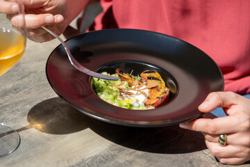 A refreshing dish of grilled peaches paired with diced cucumber and creamy burrata. This vibrant combination of sweet, savory, and fresh ingredients creates a perfect summer dish.