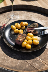 A juicy pepper steak served alongside crispy roasted potatoes. This hearty dish is perfect for meat lovers, offering bold flavors and a satisfying meal.