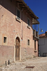 Borbona Street View with Pink House Facade, Italy