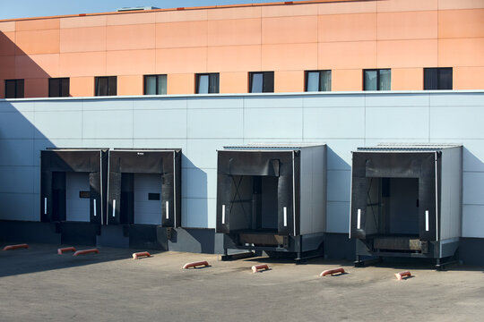 Loading dock or loading bay with bumpers, levelers, lift, dock seals or shelters, Loading bay is area of building where goods vehicles road or rail are loaded and unloaded.