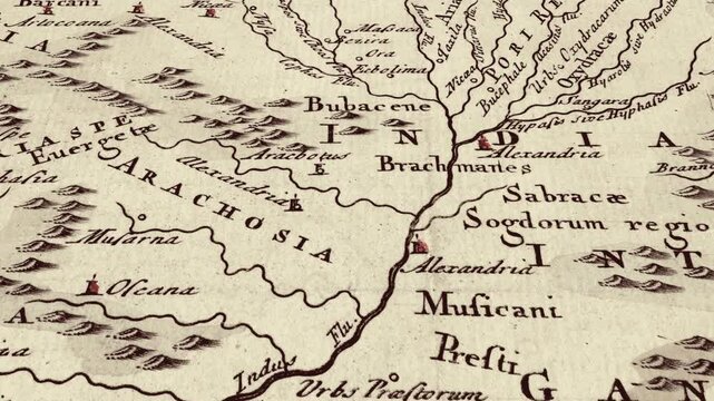 Series of pans and tracks on antique maps, starting on a sea with monsters and ships, across lands and mountains ending on a castle. Ideal for pirate or ancient travellers material.