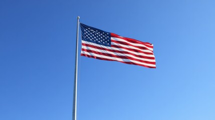 american flag in the wind honoring and mourning the U.S. military personnel who died while serving in the United States