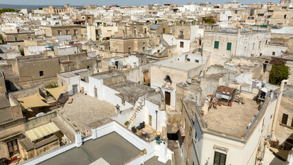 Aerial view of houses, apartments and buildings in the historic center of Grottaglie. It is a city...