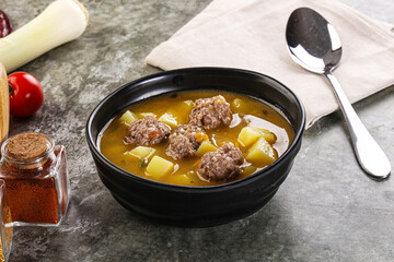 Soup with beef meatball and vegetables