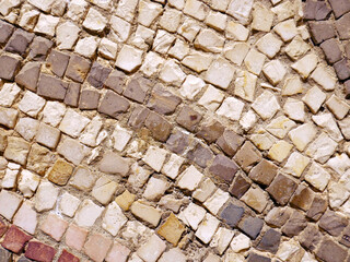 Spanish roman mosaic with circular graphic for floor decoration.