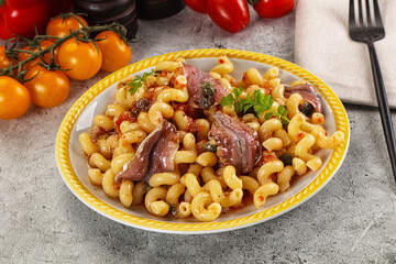 Italian pasta cellentani with anchovy