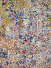 Old wall texture - rusty wall. Grunge background. Several layers of paint.