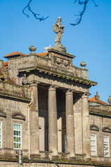 the old building of a hospital with columns in Porto