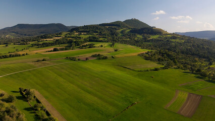Obraz premium A flight above Dettingen Teck towards the Castle Teck which is located high above the mountain 
