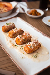 Homemade traditional spanish croquettes or croquetas. Tapas food.