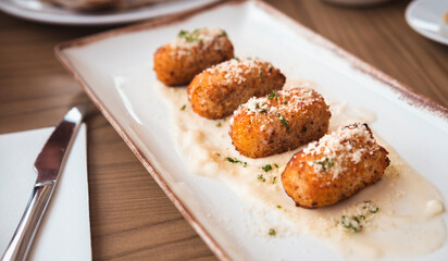 Homemade traditional spanish croquettes or croquetas. Tapas food.