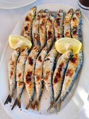 Spanish dish with fried fish and lemon.