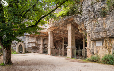 A cave carved out of the cliff on the Chemin de Croix in the sacred village of Rocamadour in the...