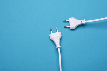 Electric sockets on a blue background