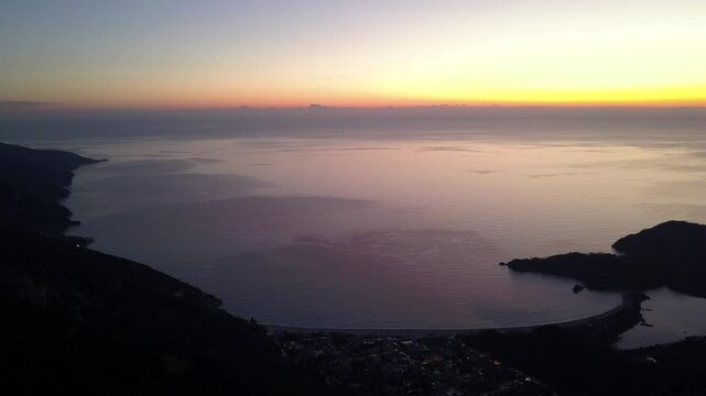 Drone view of the beautiful seascape at sunset in the coastal town of Oludeniz Fethiye Turkey 