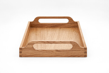 Elegant solid oak wood tray with dovetail joints and carved handles on the sides for easy carrying on white background