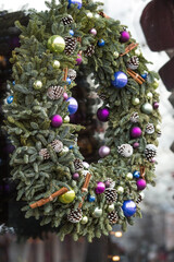 Christmas decorations on the streets of Moscow. Christmas holidays, winter landscape. A beautiful Christmas wreath on the window.