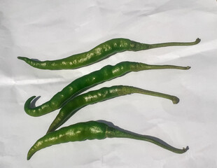 Green chillies vegetable isolated on white background 