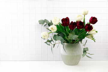 Spring flowers in vase on white backround - Image