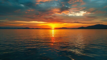 Obraz premium Gorgeous Sunrise and Sunset over the Sea: A Stunning Background Image. Experience the Beauty and Serenity.