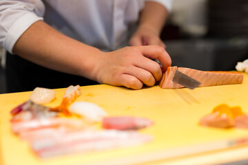 Japanese chef prepare for sashimi in restaurant