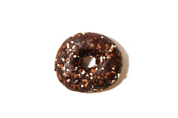 High-resolution image of a single donut coated in rich chocolate glaze, topped with white and brown sprinkles. Isolated on a white background, perfect for use in food-related projects.
