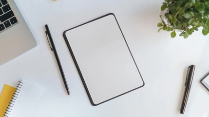Minimalist Desk Setup with Tablet and Notebook