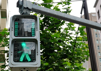 a green traffic light in Tokyo
