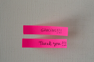 a note on the wall that says thank you