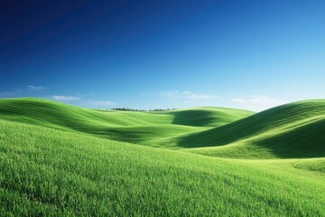 Obraz premium Rolling hills with a deep blue sky above, vibrant green grass swaying in the breeze