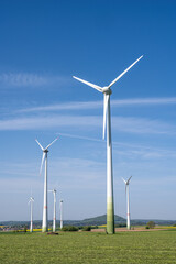 Fototapeta premium Wind turbines for green energy production seen in Germany