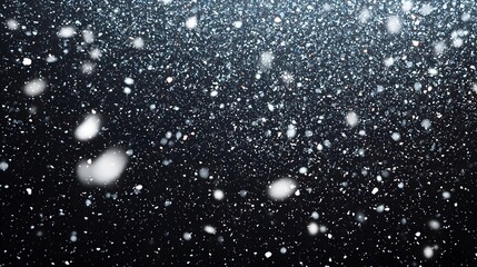 Obraz premium Magical snowfall creating a serene winter atmosphere.