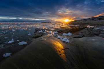 Disko Bay is a large bay on the western coast of Greenland. 