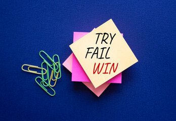 Try Fail Win symbol. Steaky notes with words Try Fail Win. Beautiful deep blue background. Business...